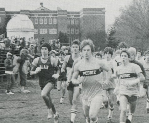 Math teacher Mark Gartner ’84 leads the Falcon pack at the 1983 Blair Day.