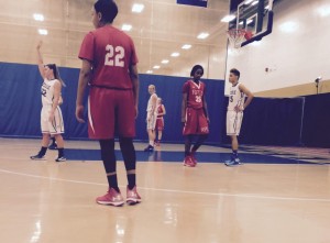 Michaela Nieuwenhuizen ‘15 and Katica Perryman ’15 are in the post last Saturday behind guard Lindsey Powers ‘15 as PGB took on Roland Park Country school in the PSIT Championship. Photographer: Rajae McClinek ’16 