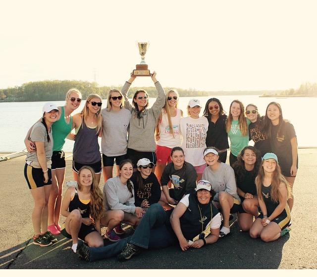 The girls crew team poses with their trophy from the MAPL championships.