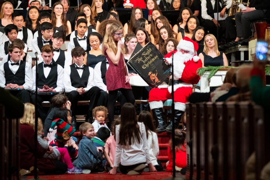 Santa reading to young children during Vespers. Photo courtesy of Andrew Marvin.