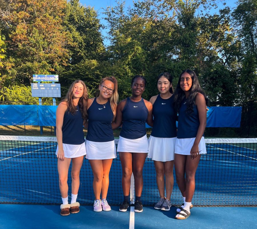 Peddie Varsity Girls Tennis team poses after a win.