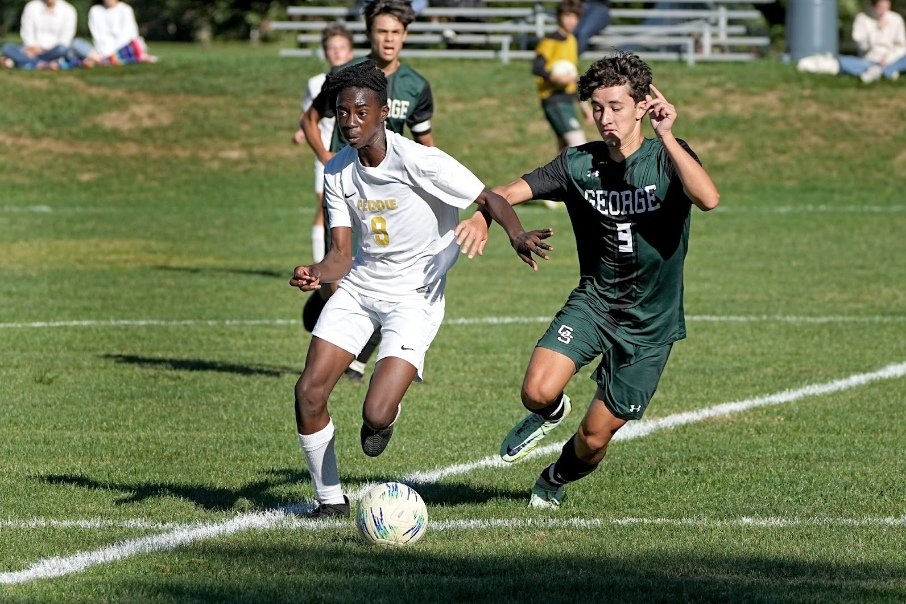 Jelani Cine ’25 looks for a pass as Peddie Boys Soccer defeats George School 3-0 on September 23, 2022.