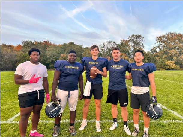 Peddie Varsity Football Team Captains and Head Coach interviewed with The Peddie News after a recent practice. From left: Isaac Saffold ’24 (PG), Joseph Forbes ’24 (PG), James (Merritt) Fisher ’25, Head Coach Anthony Fontana and Eric Cho ’25
