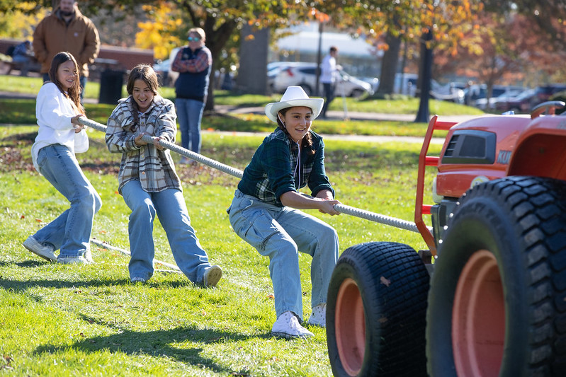 Students dragging a tractor on Farmers Day, From Peddie Flickr