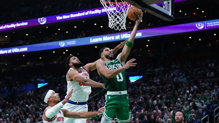 Boston Celtics’ Jayson Tatum attempts a layup against the New York Knicks on October 22, 2024 