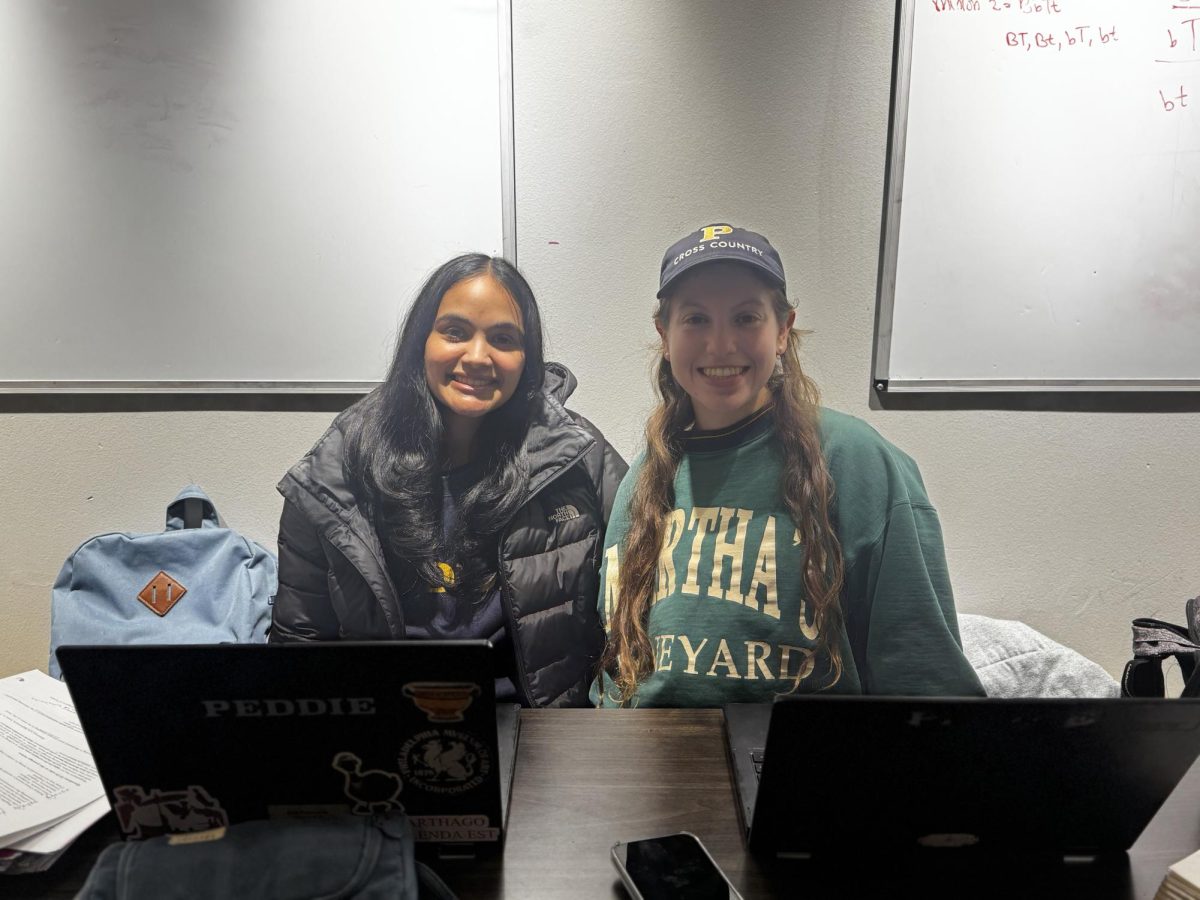 Senior prefects Kira Pramanik ’26 and Sophie Winn ’26 on duty in The Grille on Friday, February 6. 